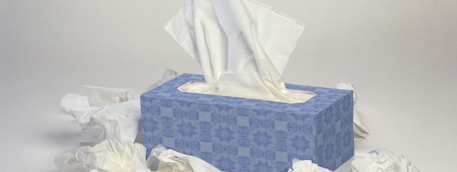 Tissue box with crumpled tissues